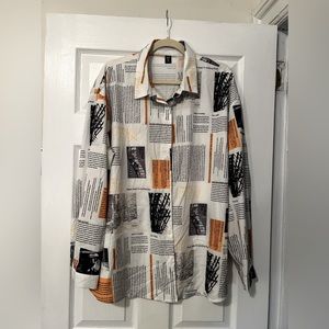 SHEIN Plus Newspaper Button Front Drop Shoulder Blouse.